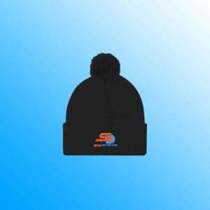 Black pom-pom beanie with fold-over cuff, designed for warmth and comfort in winter.